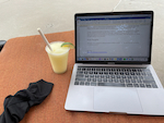 become a freelance editor - image of laptop and drink